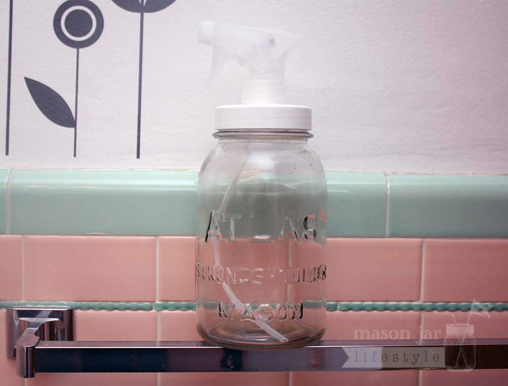 Adapta cap for regular mouth Mason jars in bathroom