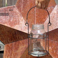 Black carrying caddy for quart Mason jar