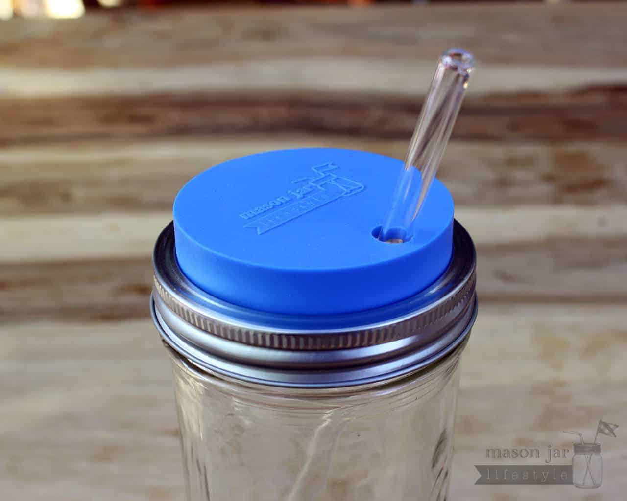 Mason Jar Lifestyle silicone straw hole tumbler lid with glass straw on Ball pint & half jar