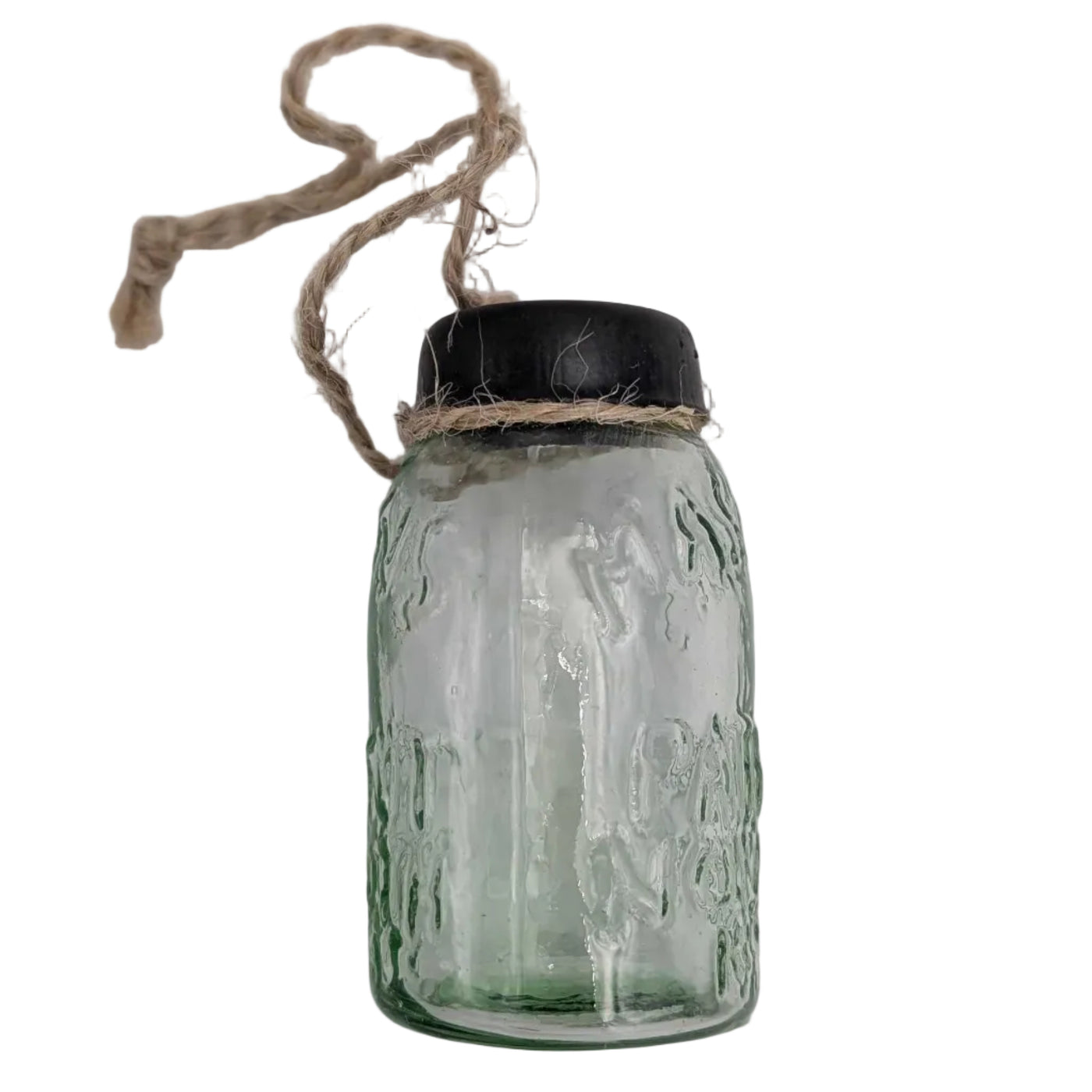 Green glass jar with a black lid and string on a white background