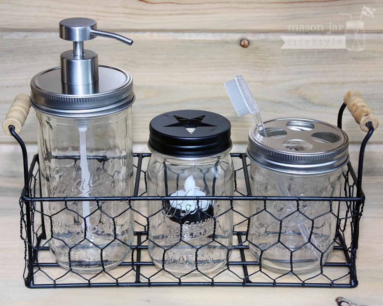 Three jar caddy with soap pump, toothbrush holder, and tea light candle holder in Ball and Kerr Mason jars