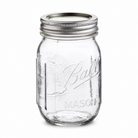 Ball 16oz regular mouth pint Mason jar with silver flat lid and band on a white background