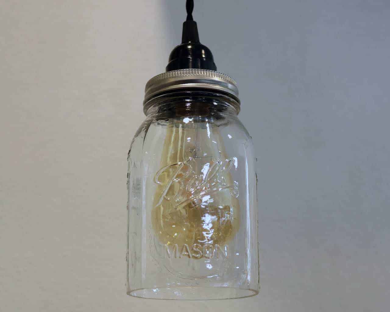 Ball regular mouth quart Mason jar pendant light full kit with hand cut jar, lid, on/off switch, and wall plug - bulb off