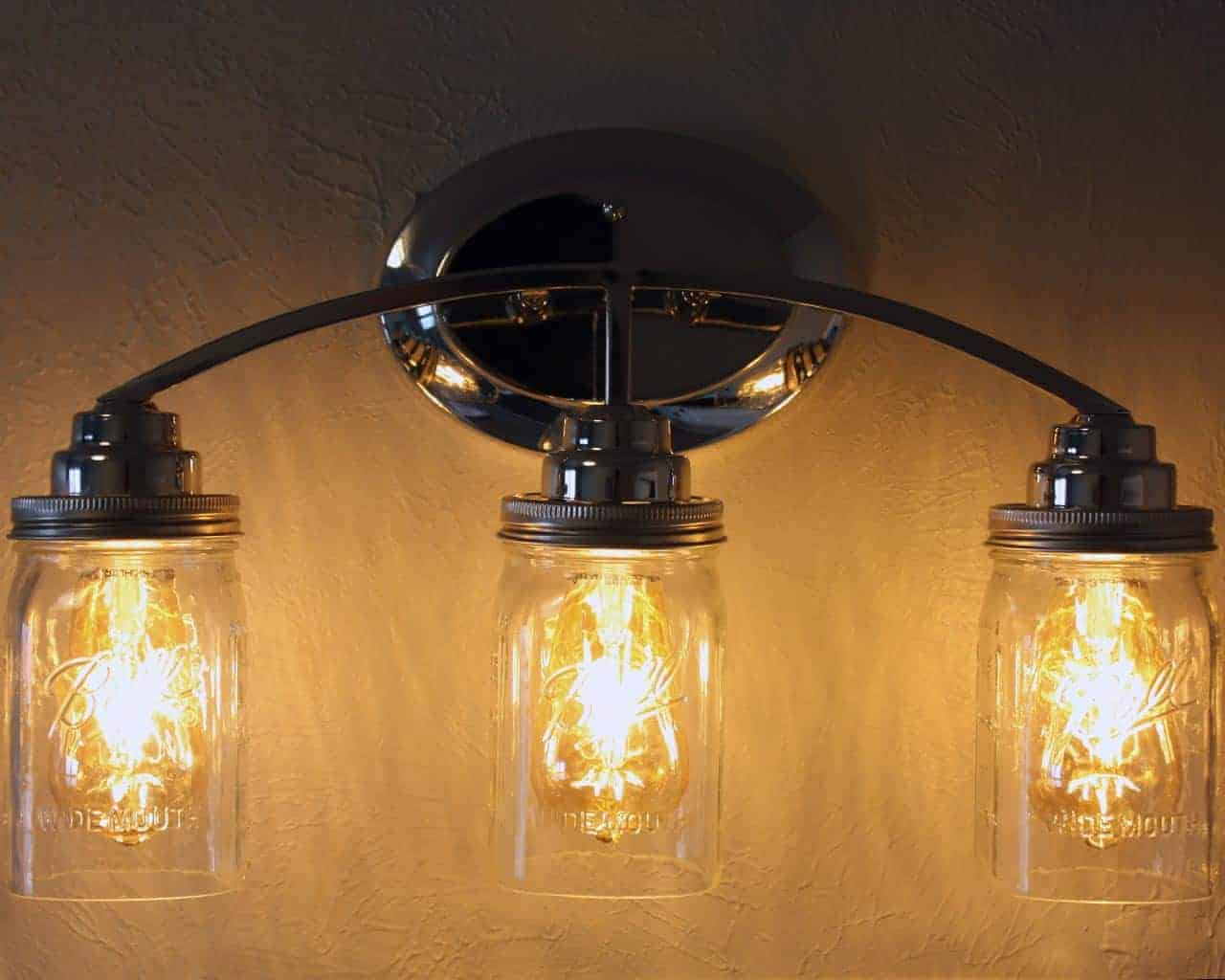 Light fixture with three quart open bottom Ball Mason jars, wide mouth lighting lids, and LED Edison bulbs