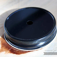 Black straw hole lid for regular mouth Mason jars side view
