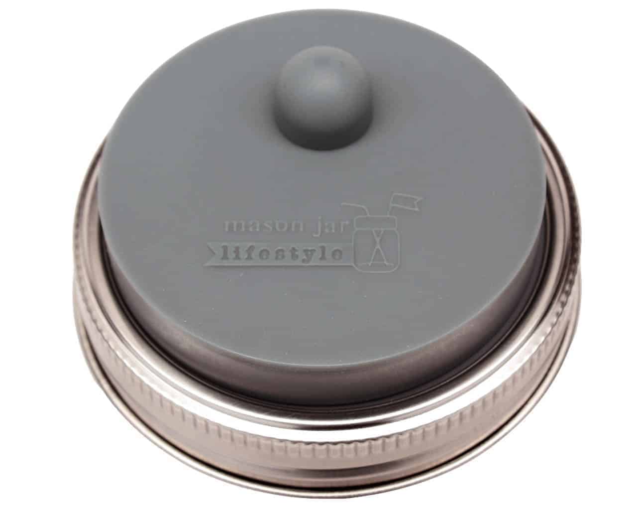 Charcoal gray silicone fermentation valve lid with stainless steel band for lacto fermenting in wide mouth Mason jars