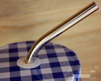 Close up of threading on thin bent stainless steel straws for Mason jars