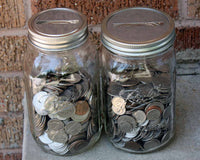 Regular and wide mouth stainless steel coin slot bank lids on Ball quart jars