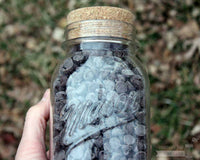 Cork lid stopper on regular mouth quart Mason jar with chocolate chips