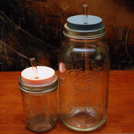 Extra long thick glass straw in half gallon 64oz Mason jar and medium glass straw in pint 16oz Mason jar