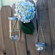 galvanized-metal-band-ring-with-chain-hanging-handle-regular-wide-mouth-mason-jars-flowers-fence