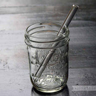 Thick glass smoothie straw in half pint Ball Mason jar