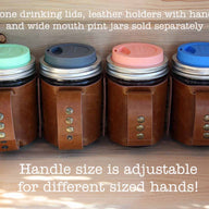 Handle size is adjustable for different sized hands! - Faux leather sleeve with handle and silicone drinking lids for wide mouth pint Mason jars