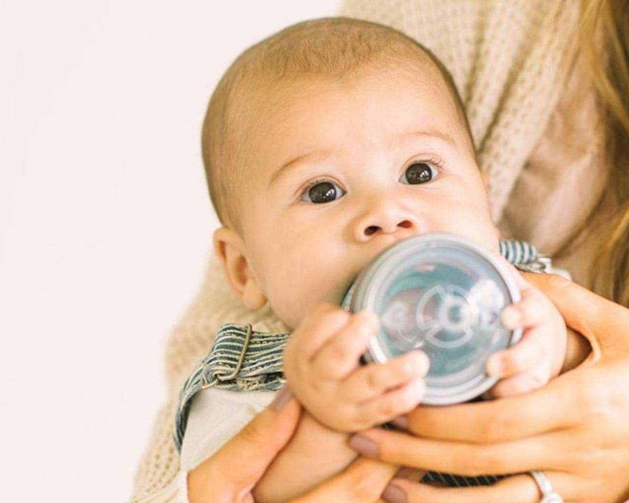 mason-bottle-nipple-baby-chewing-bottom-jar