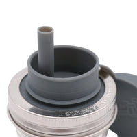 Up close shot of the silicone straw, and the mouth of the lid.