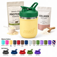Mason Jar Lifestyle 16oz glass protein shaker bottle with Butter Yellow silicone sleeve and Leaf Green carry-loop lid, beside protein and collagen powder with sleeve and lid color options.