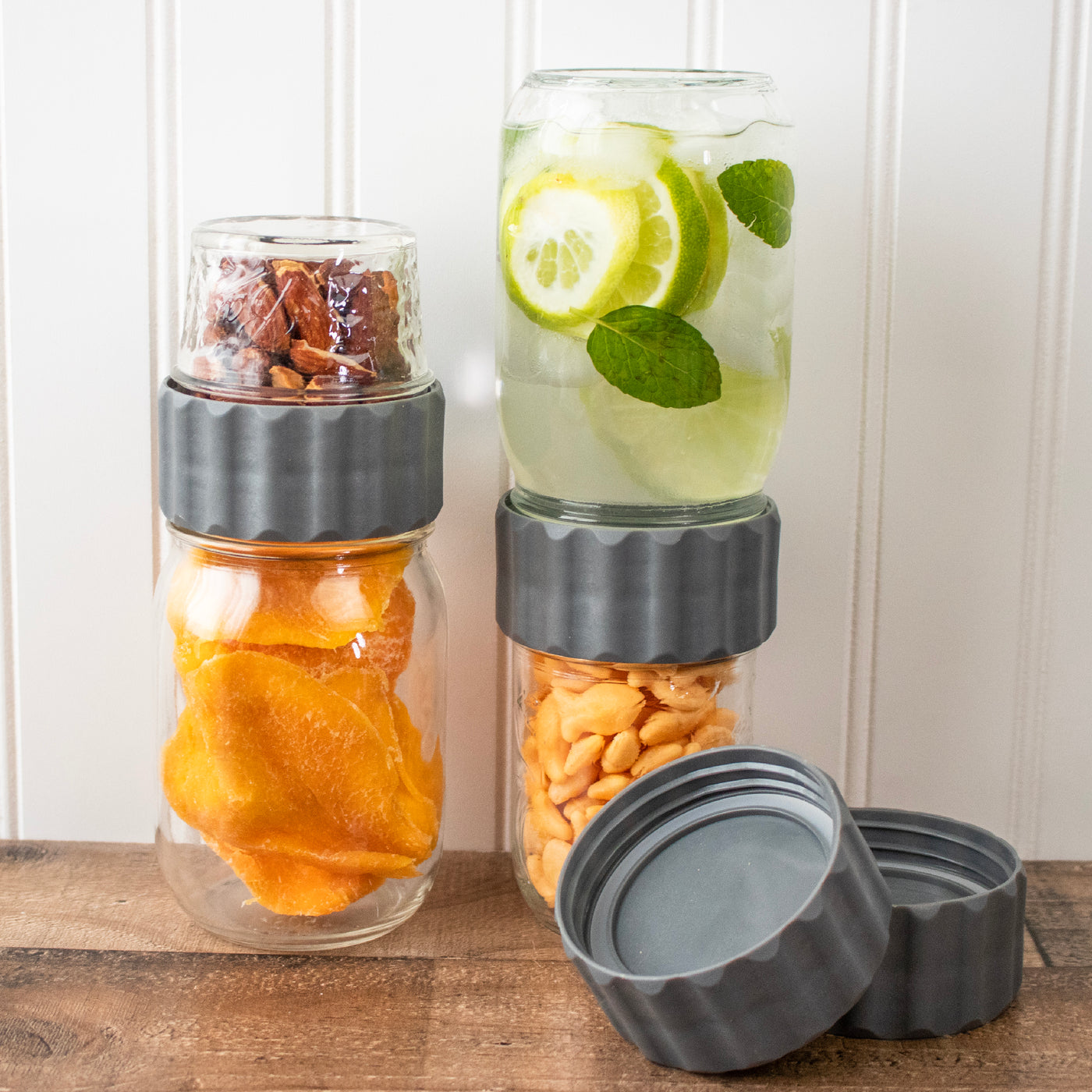 Regular mouth Mason jars connected with our 2 in 1 lids, making them one unit, with different snacks or drinks on both sides.