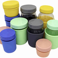 Mason Jar Lifestyle Leak proof plastic storage lids and silicone sleeves on 4oz, 8oz, 16oz, 32oz half pint quart Mason jars 5 colors