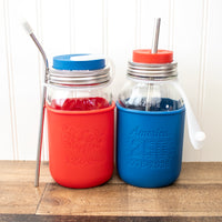 A Mason jar quarts with lids, straws, and straw straps, and the 250 anniversary sleeve designs.