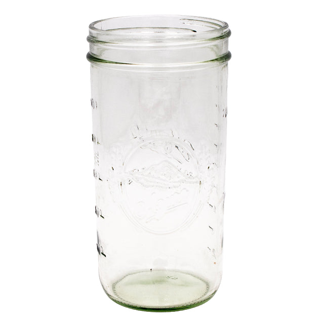 Azure Standard Mason 24oz wide mouth jar, showing off the debossed Azure logo. The logo is a simple mountain in an oval, with pieces of wheat framing it.