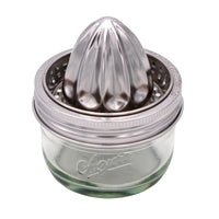 A wide mouth juicing lid on the wide mouth 8oz Mason jar, proving that our wide mouth lids fit this jar as well.