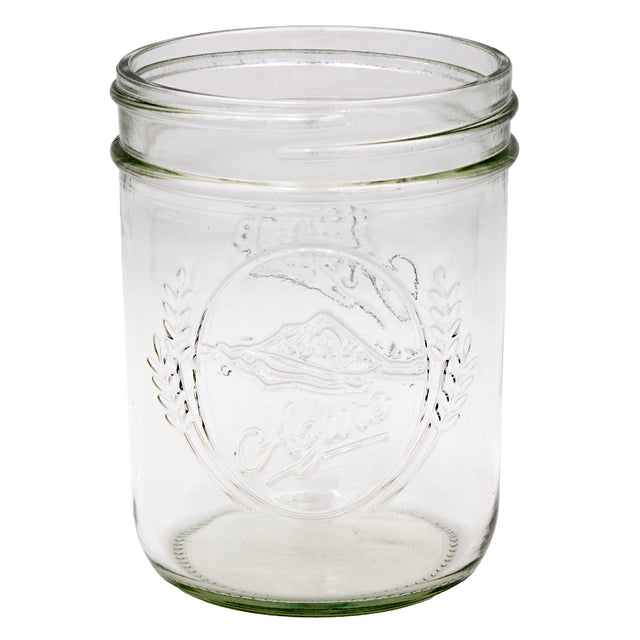 Azure Standard Mason 16oz wide mouth jar, showing off the debossed Azure logo. The logo is a simple mountain in an oval, with pieces of wheat framing it.