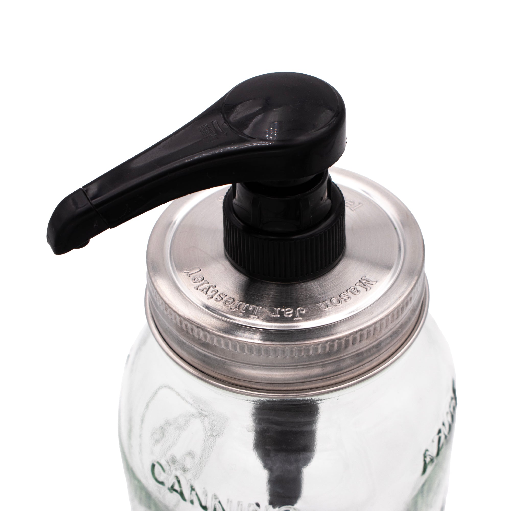 An up close image of the head of the food grade pump and lid.