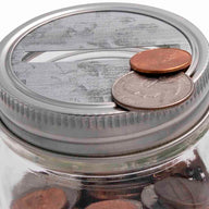 mason-jar-lifestyle-galvanized-coin-slot-bank-lid-insert-stainless-steel-band-regular-mouth-ball-mason-jar-coins-closeup