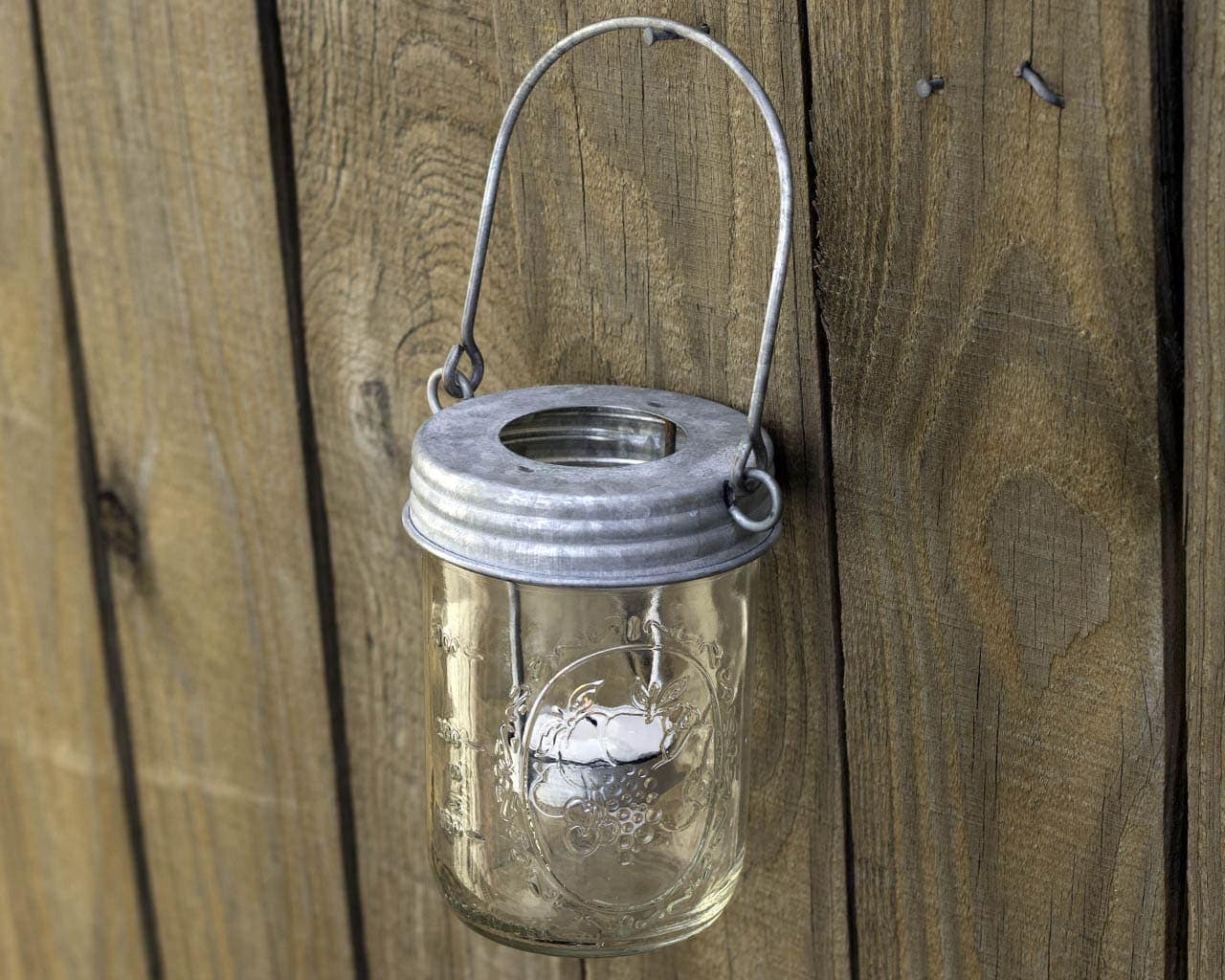 mason-jar-lifestyle-galvanized-metal-tea-light-candle-holder-round-circle-handle-up-hanging-wide-mouth-mason-jars-fence