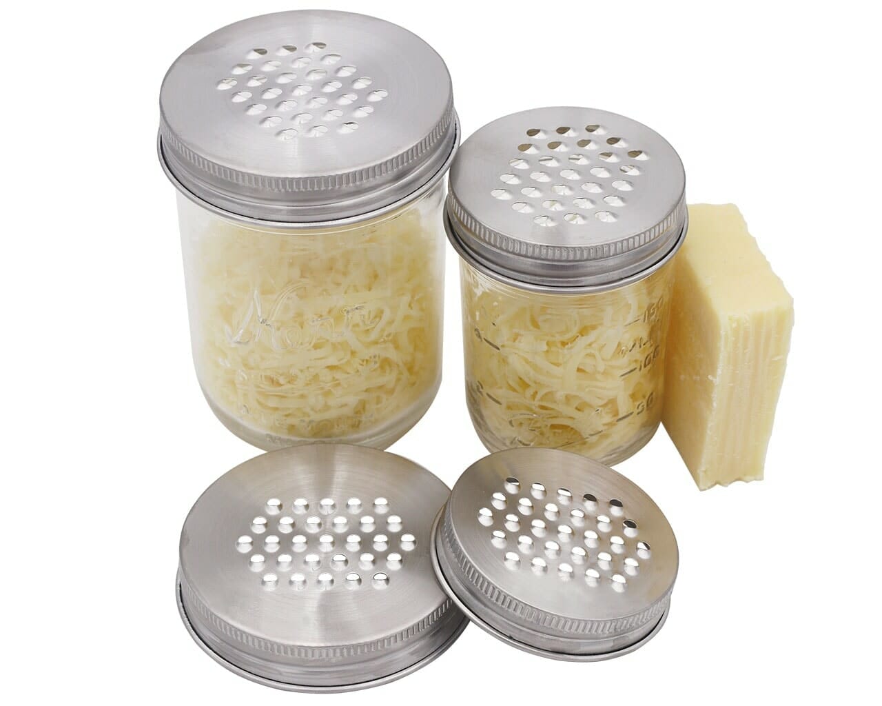 https://masonjarlifestyle.com/cdn/shop/files/mason-jar-lifestyle-grater-shredder-lid-wide-regular-mouth-mason-pint-4oz-jars-kitchen-cooking-cheese.jpg?v=1695767066&width=1280