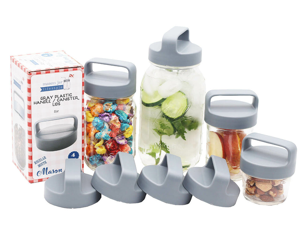 Plastic gray canister lids with handles.