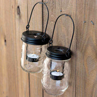 mason-jar-lifestyle-matte-black-primitive-tea-light-candle-holder-star-handle-up-hanging-regular-wide-mouth-mason-jars-fence