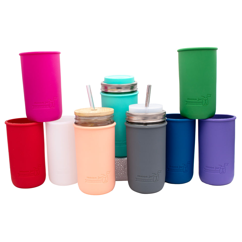 Silicone sleeves for 24oz wide mouth Mason jars in these colors: cherry red, berry pink, frost, coral, aquamarine, charcoal gray, deep blue, leaf green, and ultra violet.