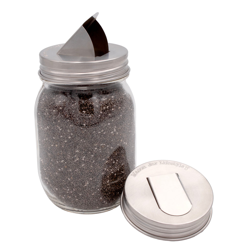 Regular mouth stainless steel grain dispensing lid top on white