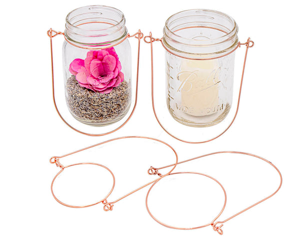 https://masonjarlifestyle.com/cdn/shop/files/mason-jar-lifestyle-regular-wide-mouth-copper-wire-handle-hanger-16oz-pint-kerr-ball-flower-potpurri-candle-decor-2_grande.jpg?v=1695765568