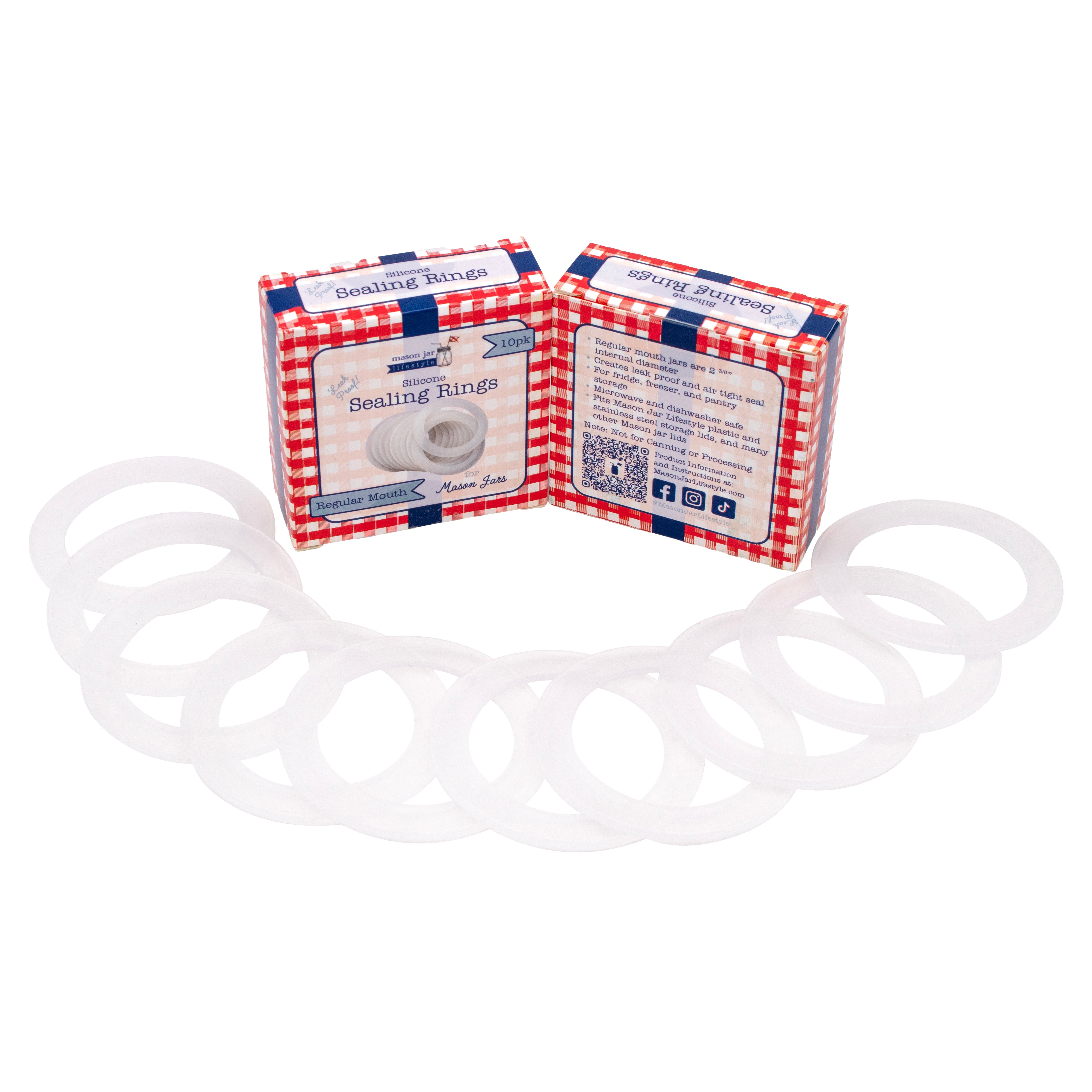 Two retail packaged boxes for the product propped up, one forward and one backwards. 10 silicone sealing rings splayed out in front of them.