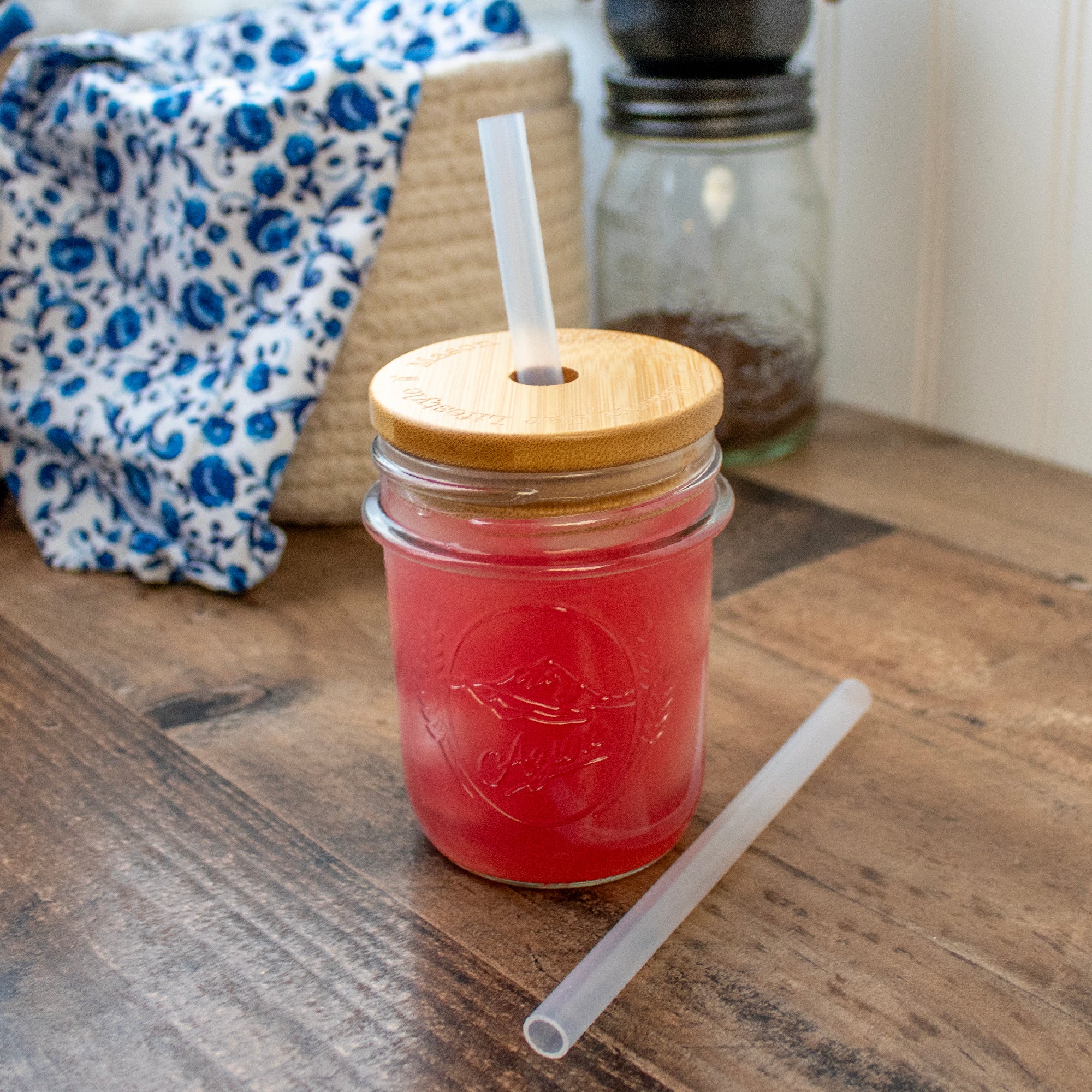 Short silicone straw in regular mouth 8oz Mason jar, with bamboo straw hole lid.