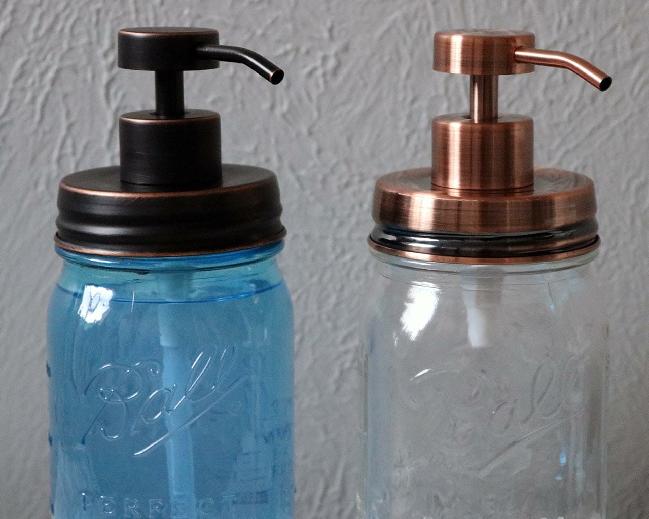 Vintage copper and oil rubbed bronze soap pump dispenser lid kits on regular mouth Ball Mason jars