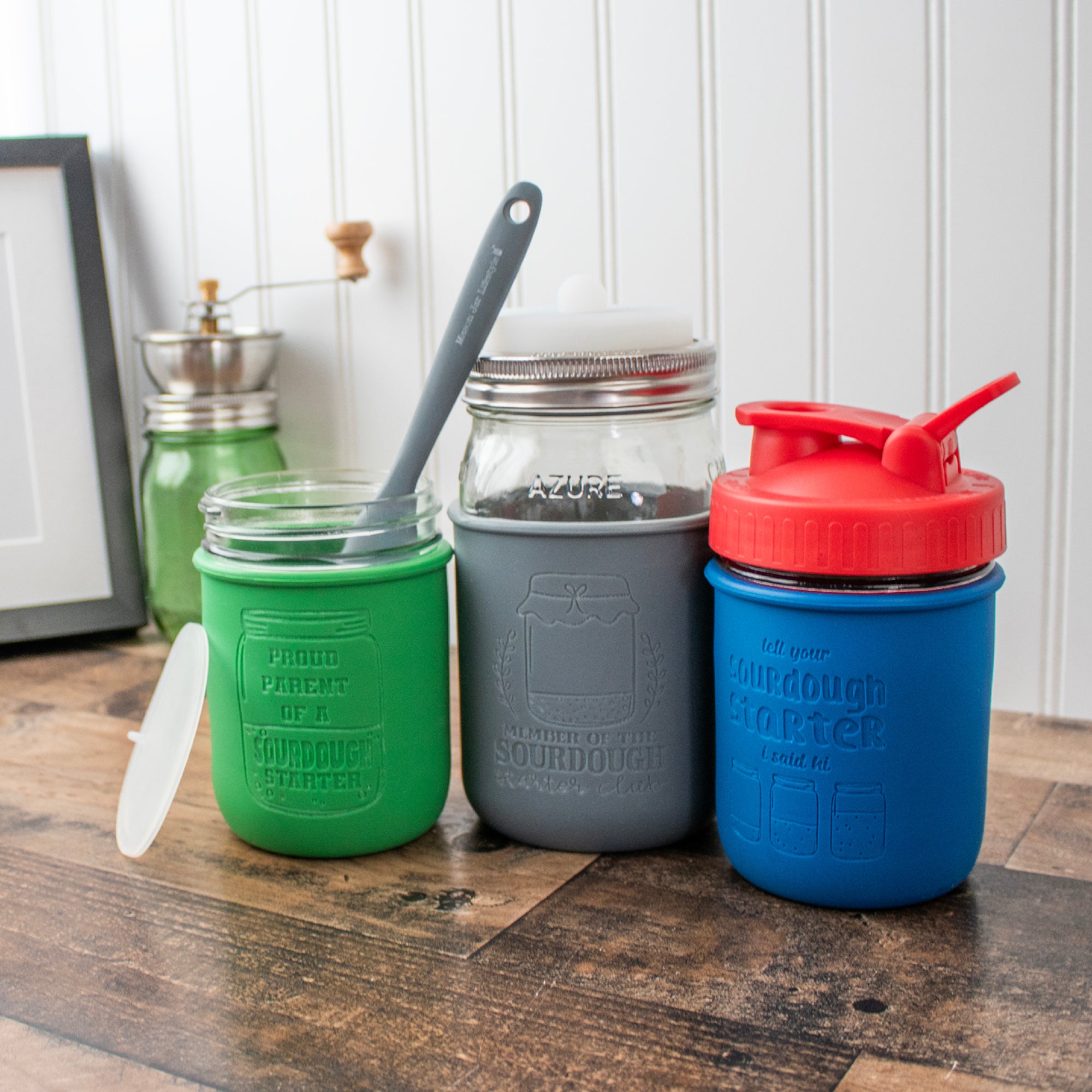 3 example set ups of our custom engraved-to-order laser engraved sleeves on Mason jars with various lids.
