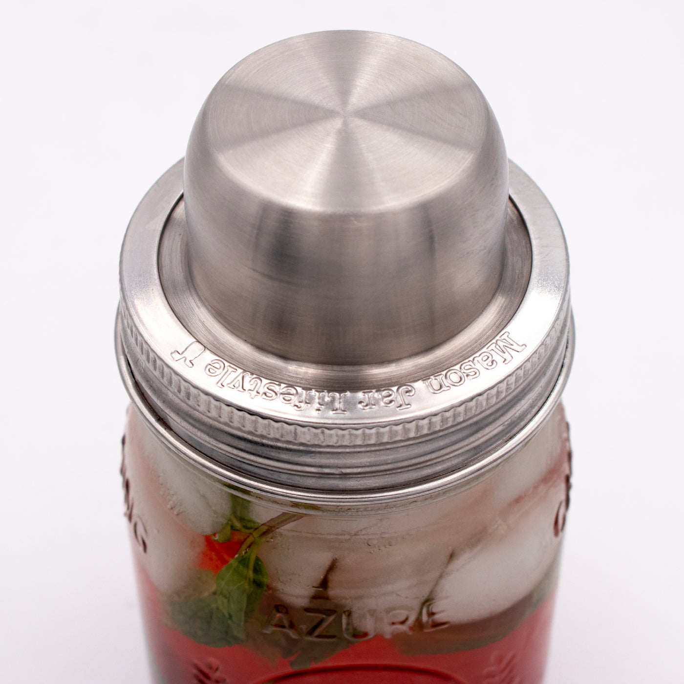 Cocktail shaker with the lid on.