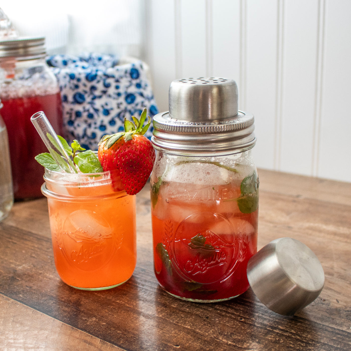 Strawberry syrup cocktail made with the Mason jar cocktail shaker lid.