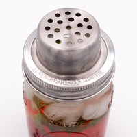 Cocktail shaker with the top off.