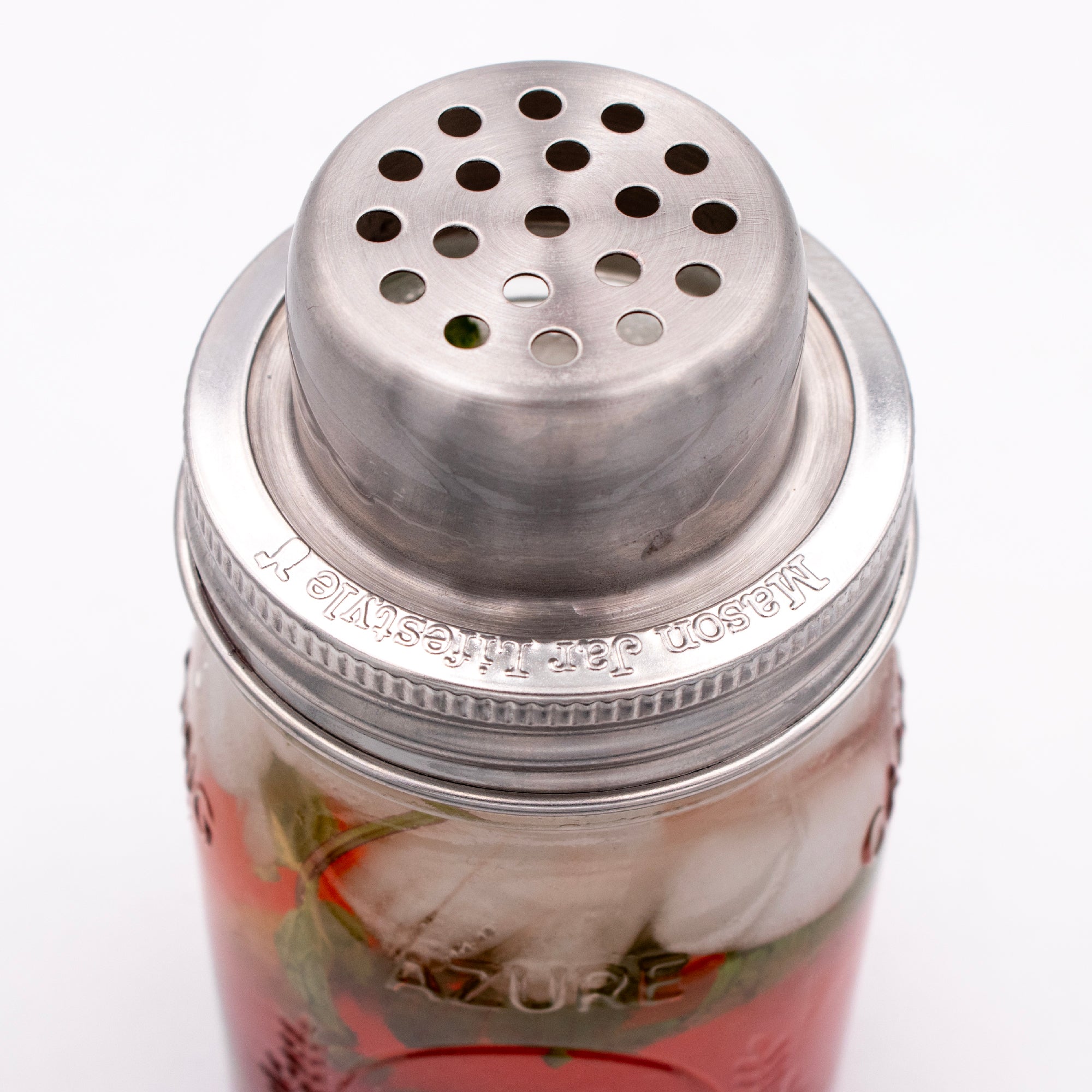 Cocktail shaker with the top off.