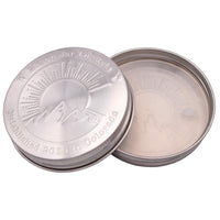 Two Colorado lids, one flipped over so you can see the silicone lid liner on the inside.