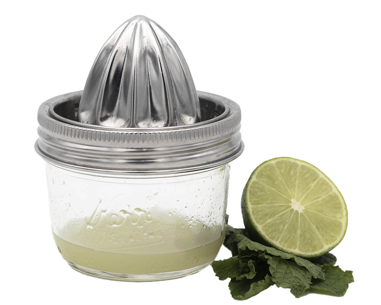 https://masonjarlifestyle.com/cdn/shop/files/mason-jar-lifestyle-stainless-steel-juicer-juicing-lid-wide-mouth-8oz-kerr-lime-mint-cocktail.jpg?v=1698867443&width=1400