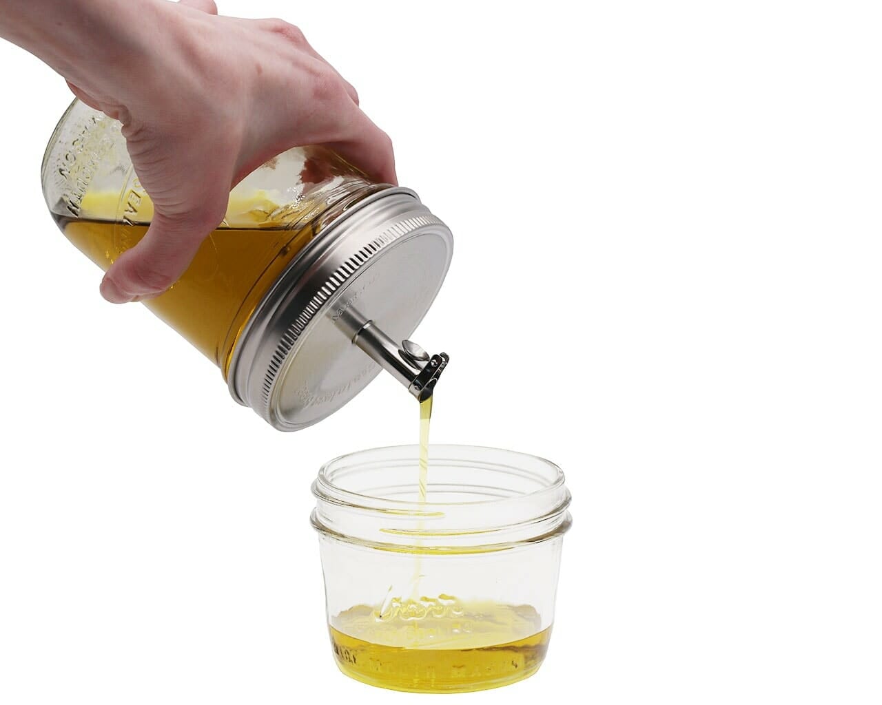 https://masonjarlifestyle.com/cdn/shop/files/mason-jar-lifestyle-stainless-steel-pour-spout-oil-cruet-lid-wide-mouth-ball-olive-oil-pouring.jpg?v=1695767218&width=1280