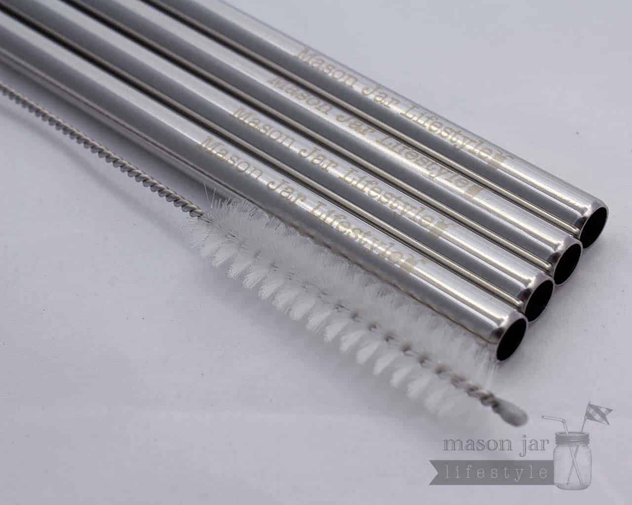 Four stainless steel straws with safer rounded ends and cleaning brush
