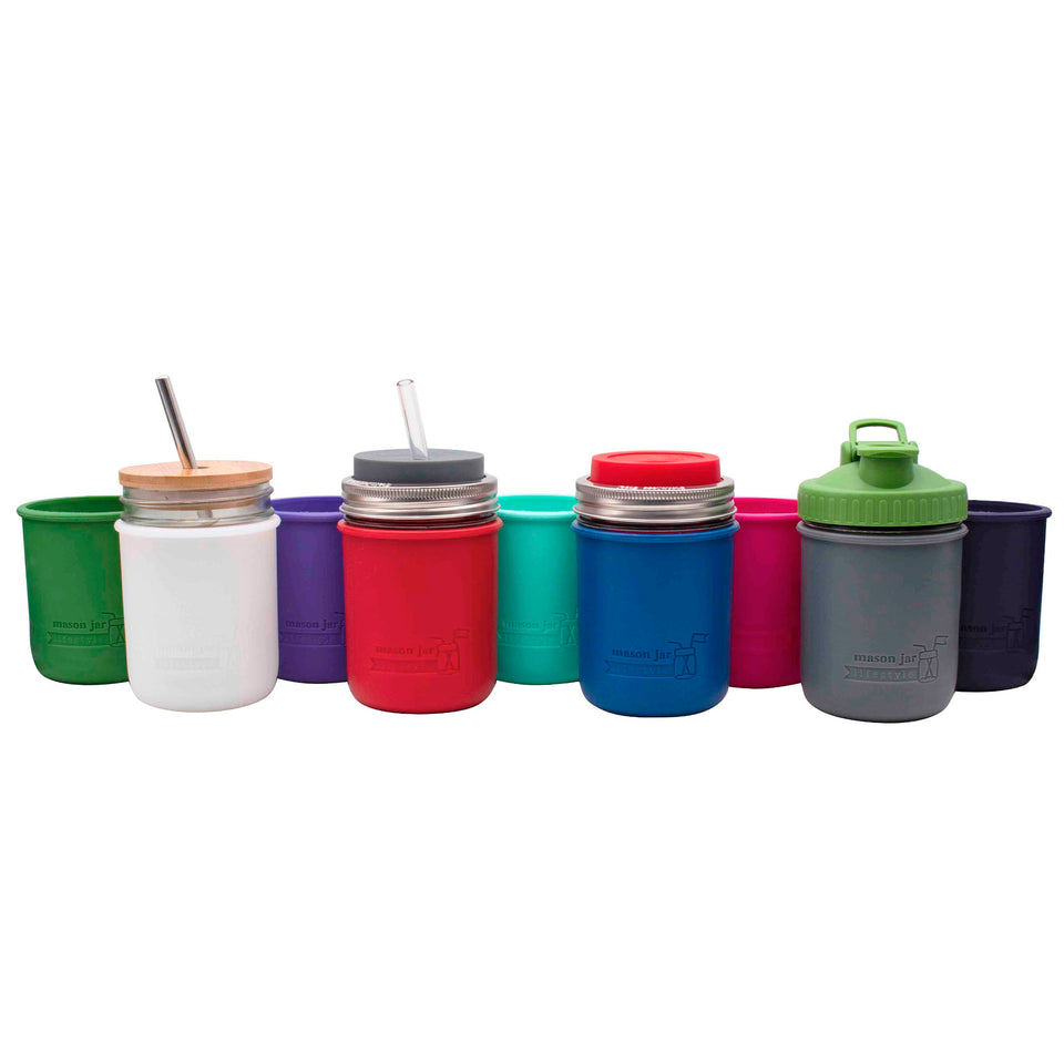 Silicone sleeves for wide mouth pint Mason jars, in these colors: leaf green, frost, ultra violet, cherry red, aquamarine, deep blue, berry pink, charcoal gray, and midnight blue.