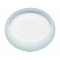 Up close on a single fermentation weight, which is made of thick glass.