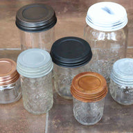 Decorative and primitive Mason jar lids with Ball Mason jars